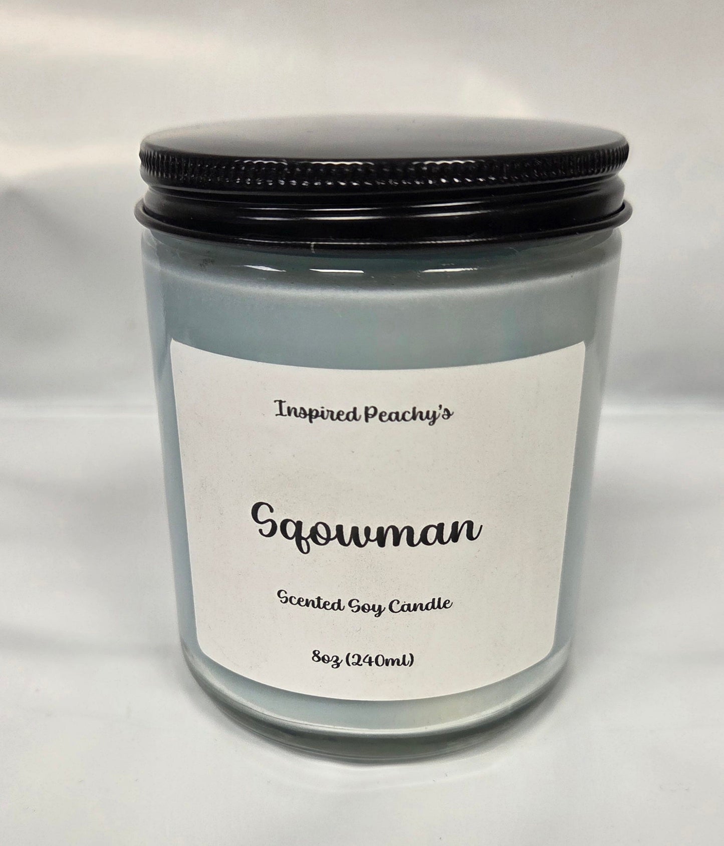 Sqowman Candle